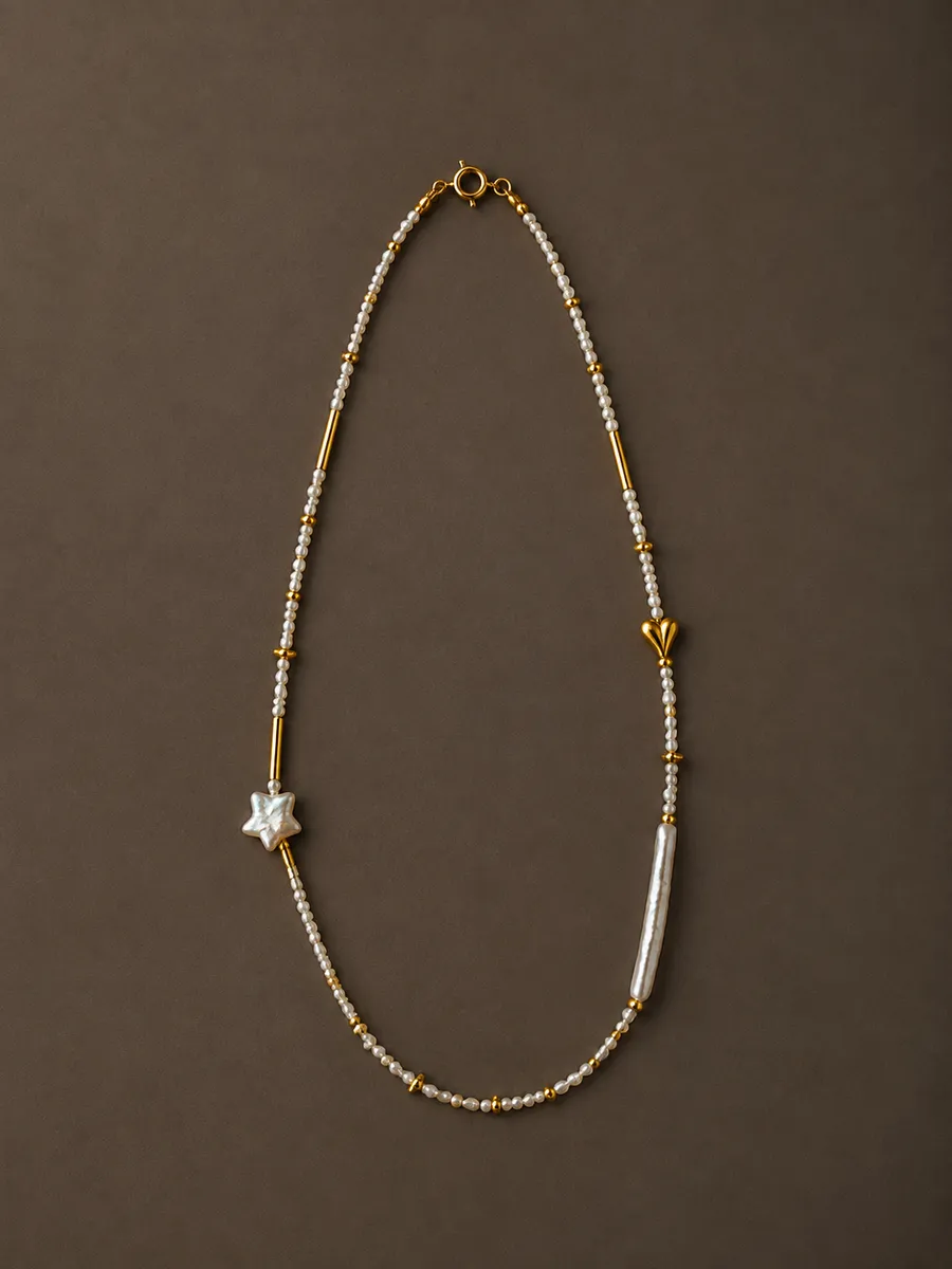 Colier Aurora · Stea baroc — perle baroc · stea sidefată
