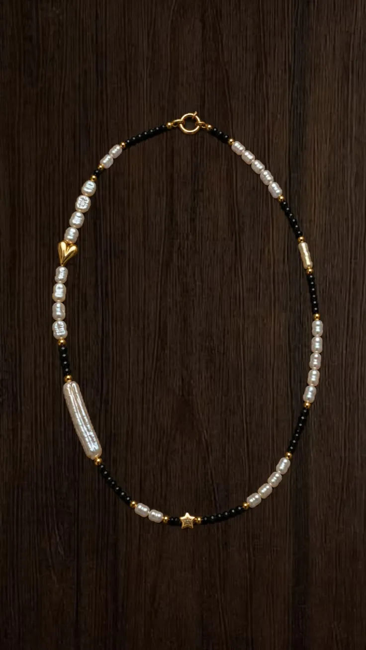 Necklace Busy · Heart — black lapis lazuli · white pearls · gold-plated heart
