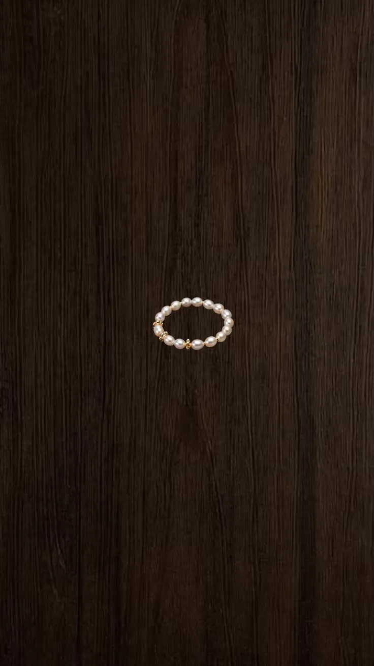 Necklace Sunrise · Ring — stretch ring · white pearls · gold accents