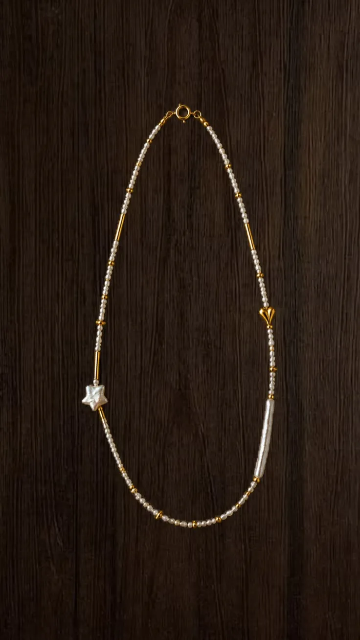 Necklace Sunrise · Baroque Star — baroque pearls · mother-of-pearl star
